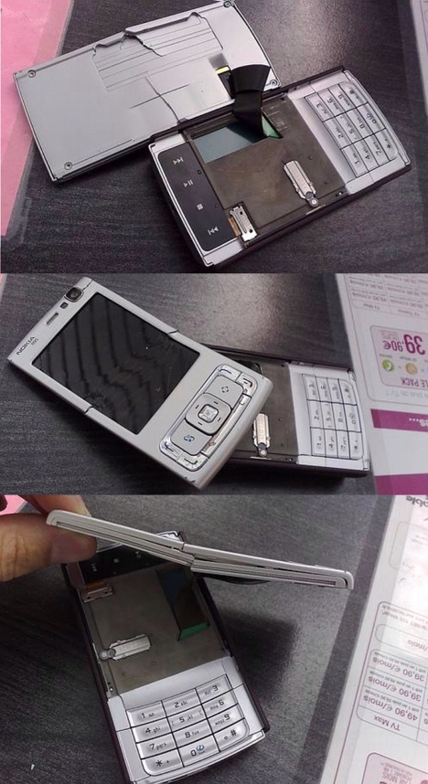 Nokia N95 destroyed and insides strewn bare