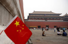 China jails blogger for writing about democracy