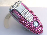 Pink Moto Bluetooth headset covered in Swarovski crystal bling